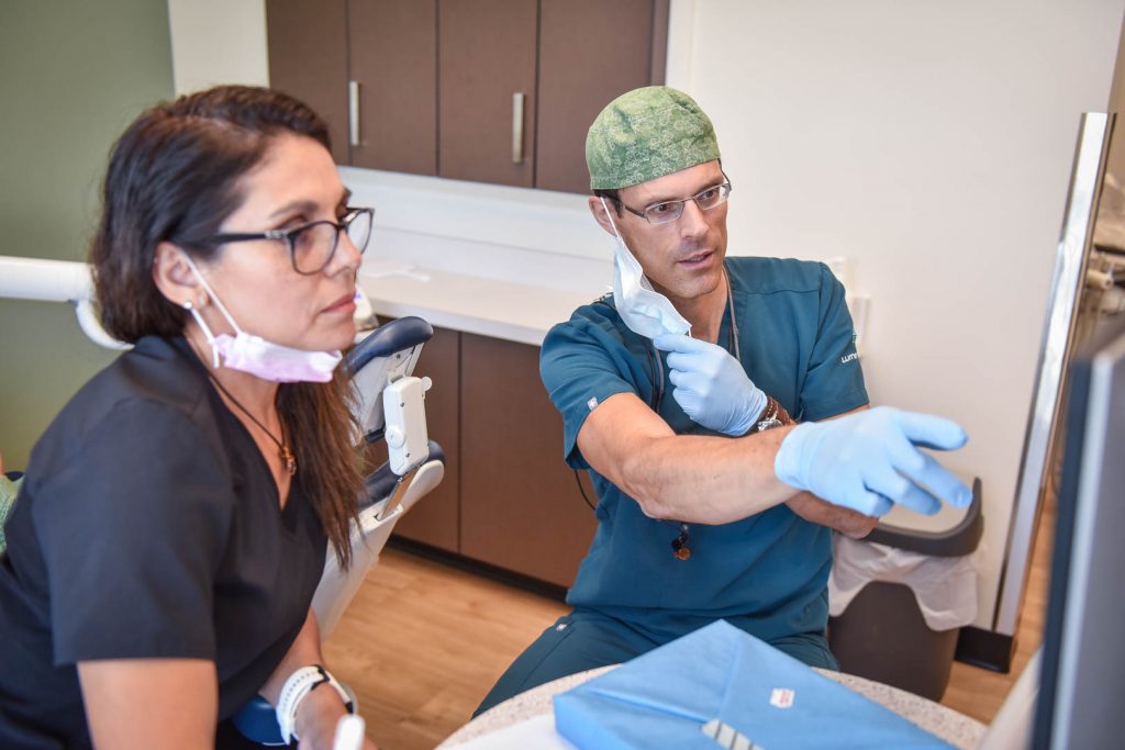 Dr. Courtney Doerksen with Assistant | Lume Dental | General & Family Dentist | Red Deer